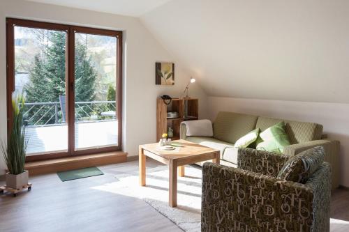 Χώρος καθιστικού στο Haus Alexandra inkl MeineCard Plus