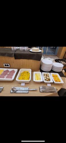 a table with several dishes of food on it at Seoul Modern Cozy Stay in Seoul