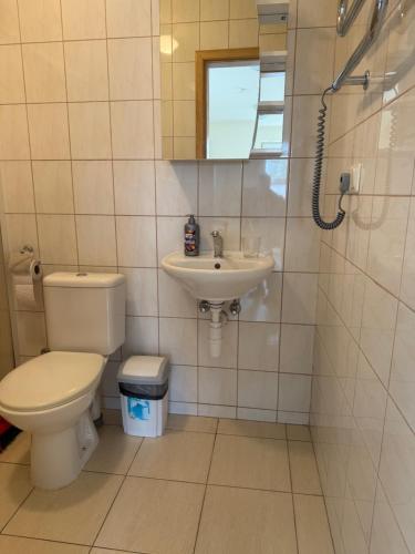 Salle de bains dans l'établissement Palanga City center