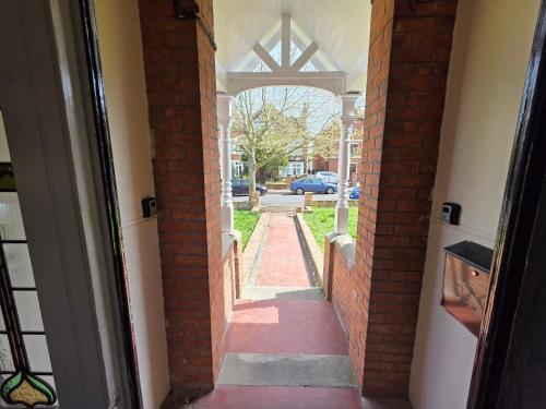 an entrance to a building with an open door at Charming & Energetic - 8ight Havens Folkestone in Folkestone
