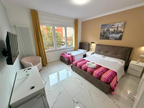 Postel nebo postele na pokoji v ubytování Desire guest House