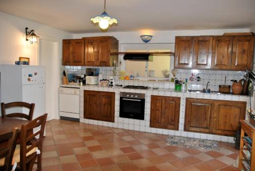 Η κουζίνα ή μικρή κουζίνα στο CASA MARTA - Appartamento con giardino