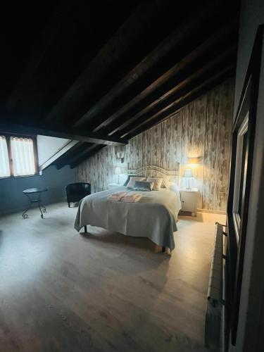 Katil atau katil-katil dalam bilik di Apartamentos El Ardinal
