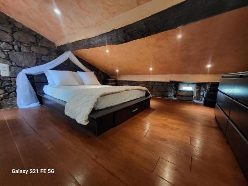 Postel nebo postele na pokoji v ubytování Maison avec spa aux portes d'Ajaccio