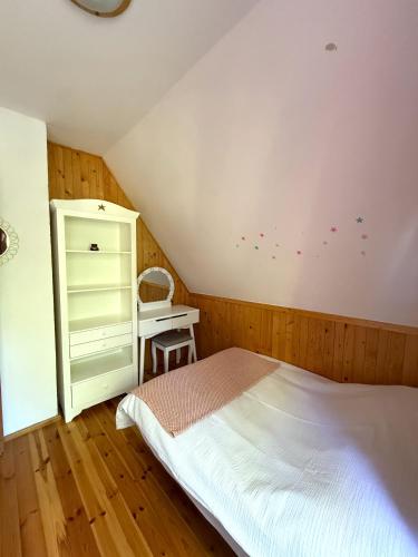 Postel nebo postele na pokoji v ubytování Masuria Hut