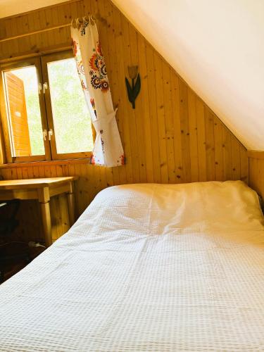 Postel nebo postele na pokoji v ubytování Masuria Hut
