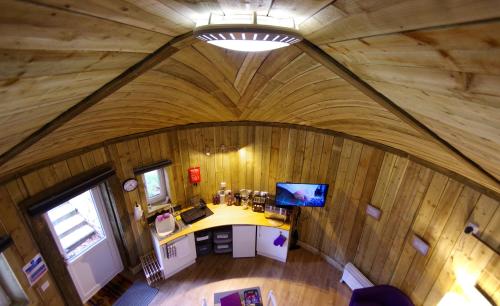 an overhead view of a room in a wooden house at Fun holiday lodges in historic walled garden near Falkirk, Heart of Scotland Holidays in Falkirk