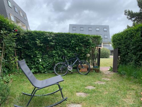 Vonkajšia záhrada v ubytovaní F1 véranda jardinet en résidence front de mer