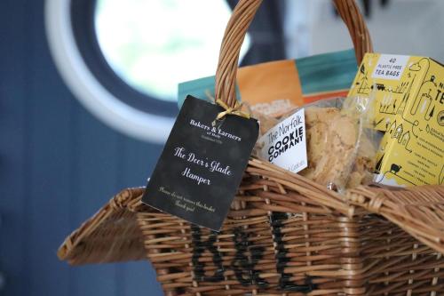a basket of bread with a price tag on it at Retreats in Norwich
