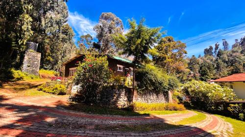 Κήπος έξω από το De Huts Kodaikanal
