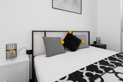 Postel nebo postele na pokoji v ubytování Jantar Resort Flatbook - Wynajem Apartamentów nad Morzem