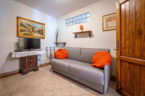 TV a/nebo společenská místnost v ubytování CASA ELIA Tuscany- Lucca with private pool at exclusive use!