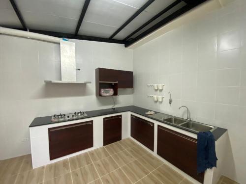 Η κουζίνα ή μικρή κουζίνα στο Homey Place 2