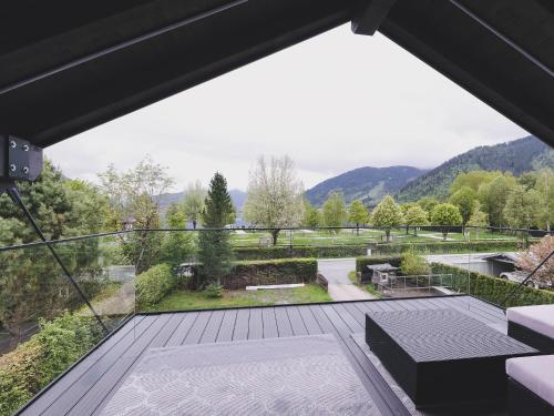a view from the balcony of a house at Appartements Prielau by we rent, SUMMERCARD INCLUDED in Zell am See