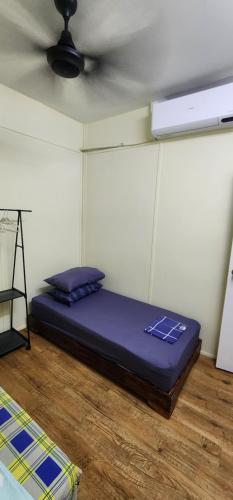 Ummi Studio Homestayにあるベッド