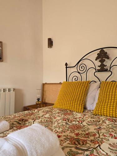 Ένα ή περισσότερα κρεβάτια σε δωμάτιο στο Casa da Tia Outra