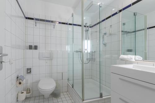Ferienwohnung Ostseesonne - 5-Sterne-Urlaub mit Balkon direkt an der Ostsee photo 9