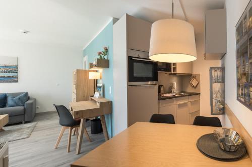 Ferienwohnung Ostseesonne - 5-Sterne-Urlaub mit Balkon direkt an der Ostsee photo 13