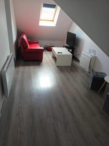 Гостиная зона в Appartement confortable avec piscine à Cour-Cheverny
