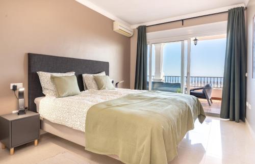 En eller flere senge i et værelse på Luxurious & Elegant 3-bed apartment - Mijas Pueblo
