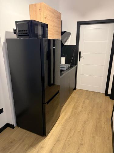 Kuchyň nebo kuchyňský kout v ubytování ICE KING Apartament