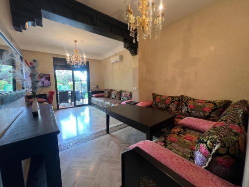Ruang duduk di La Perle de Marrakech by Atlas Golf Resort