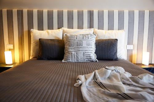 Katil atau katil-katil dalam bilik di Villa Dapper Apartment 3
