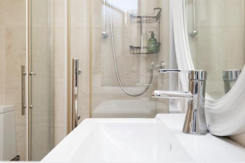 a bathroom with a sink and a shower at 2 Bedroom house 12 Rutland in Dublin