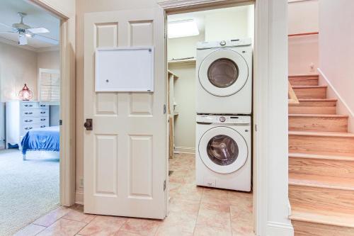 a laundry room with a washer and dryer at Hot Tub and Trail Access Treehouse in Landrum! in Landrum