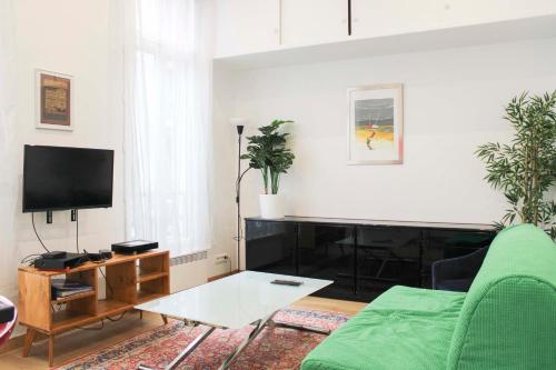 Photo de la galerie de l'établissement Charming apartment in the heart of Paris, à Paris