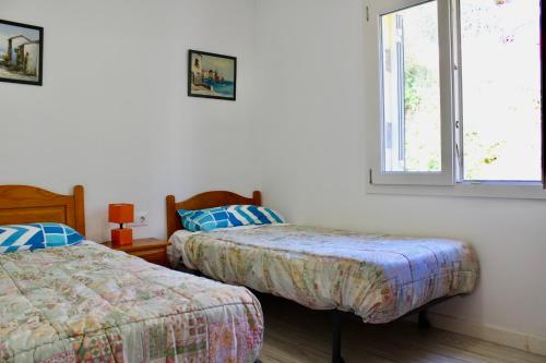 Ένα ή περισσότερα κρεβάτια σε δωμάτιο στο Hauzify I Casa Vistamar