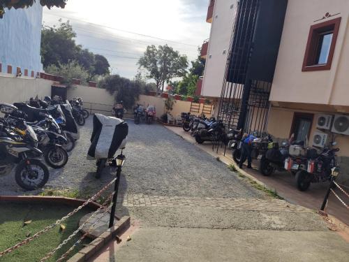 a group of motorcycles parked next to a building at Hotel Ave Maria in Selcuk