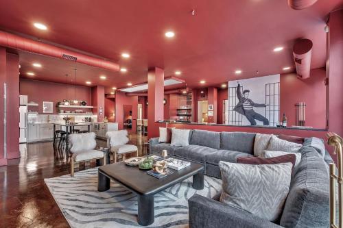 a living room with a couch and a table at Nashville Elvis Suite 4BR by Maddox Hotel in Nashville