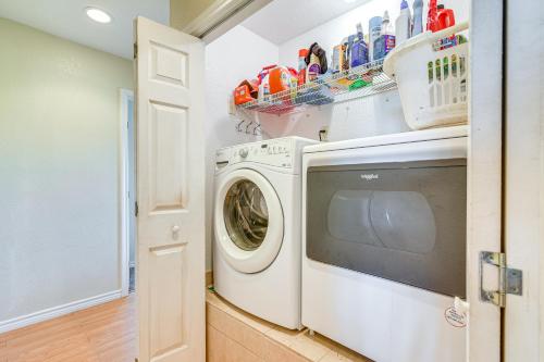 a laundry room with a washer and dryer at Intracoastal Views and Deck Surfside Beach Home in Surfside Beach