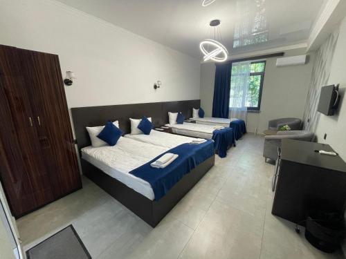 Katil atau katil-katil dalam bilik di Zangu Hotel