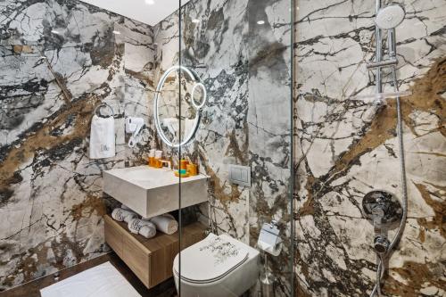a bathroom with a shower and a toilet at Serene Haven Cozy Community Courtyard View in Dubai