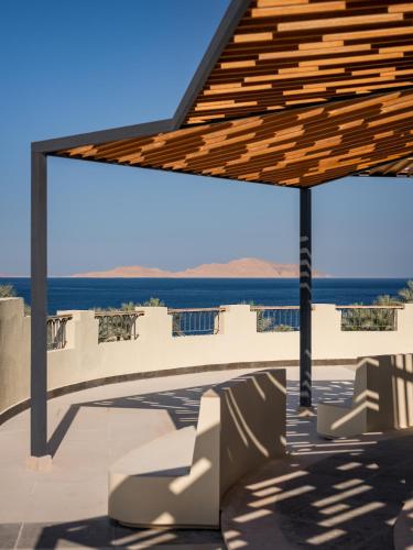 a pavilion on a roof with a view of the ocean at The Grand Hotel Sharm El Sheikh in Sharm El Sheikh