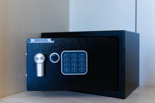 a small black box with a remote control at AGRITURISMO 8e28 CAPALBIO in Nunziatella