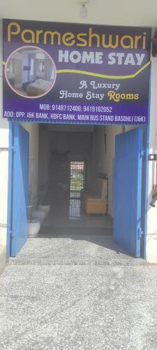 a sign for a home stay in a building at Parmeshwari HOMESTAY in Jāmb