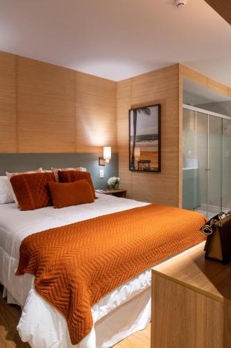 Katil atau katil-katil dalam bilik di Canto Hotel