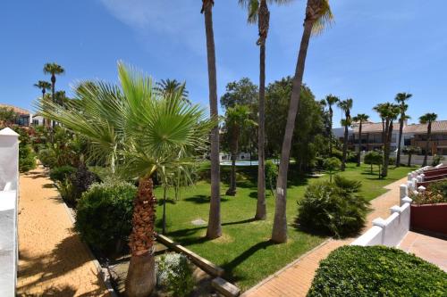 Dúo de bajos con jardín, juntos y climatizados en Aldea del Coto