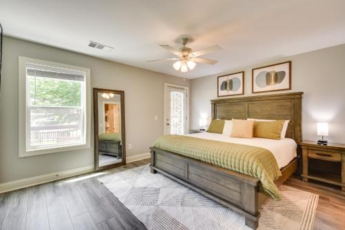a bedroom with a bed and a ceiling fan at Walkable Condo 3 Mi to Unicoi State Park in Helen