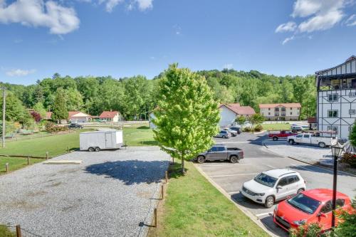 an aerial view of a parking lot with cars parked at Walk to Main Street Shops Helen Escape with Balcony in Helen