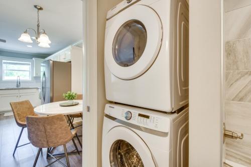 a laundry room with a washer and dryer at 1 Block to Main St and River Downtown Helen Condo in Helen