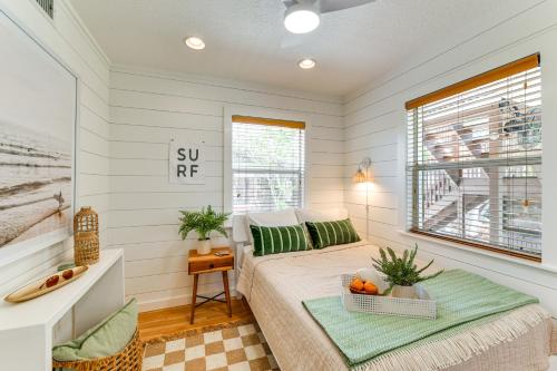 a bedroom with a bed and a window at Walk to Gulf Luxe Luau-Themed Gem in Holmes Beach in Holmes Beach
