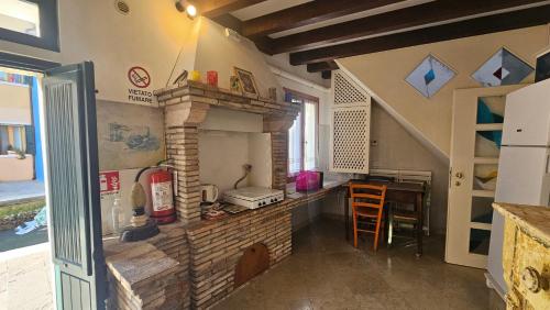 Foto Casa Yellow Corner - Seasons Real Estate - Burano 3