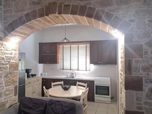 Kuchyň nebo kuchyňský kout v ubytování Odyss Pyrgos Residence