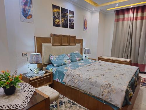 Postel nebo postele na pokoji v ubytování Sidi Beshr Luxury apartment Side Seaview