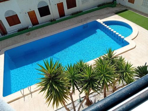 Studio with pool and sunrise view at 10 min beach walk