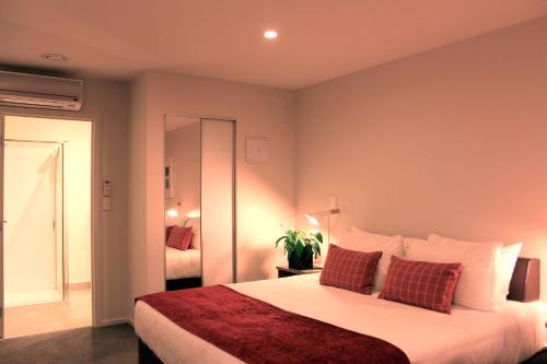 Ein Bett oder Betten in einem Zimmer der Unterkunft Quest Taupo